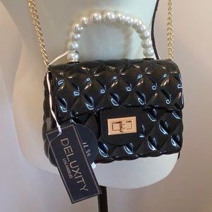 NWT Deluxity vinyl padded purse.  Pearl handle and gold chain for crossbody